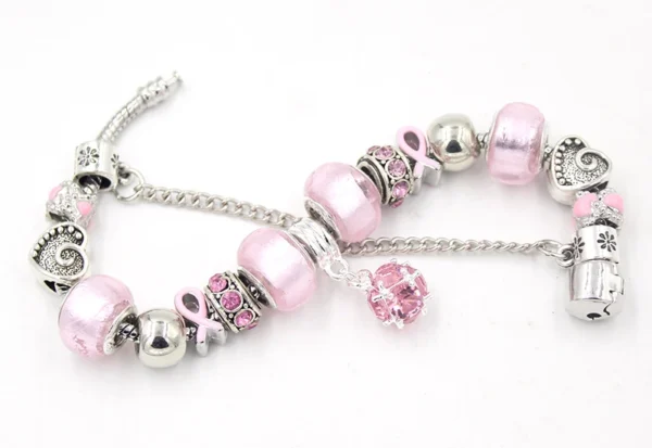 Ball Bead Bracelet with pink beads and charms.