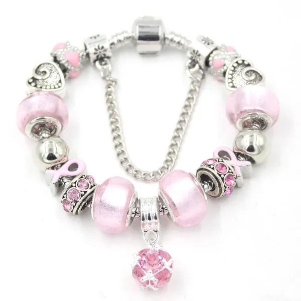 A pink Ball Bead Bracelet with silver charms and beads.