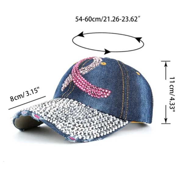 A bling baseball hat with a pink ribbon on it.