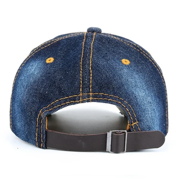 A denim Bling Baseball Hat with a brown leather strap.