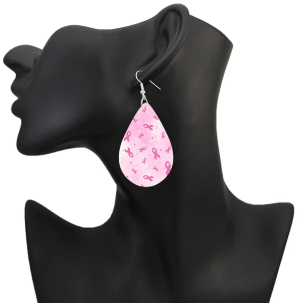 A mannequin wearing pink tear shaped Water Drop Earrings.