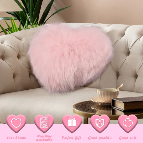 A Soft Plush Heart Shaped Pillow on a couch.